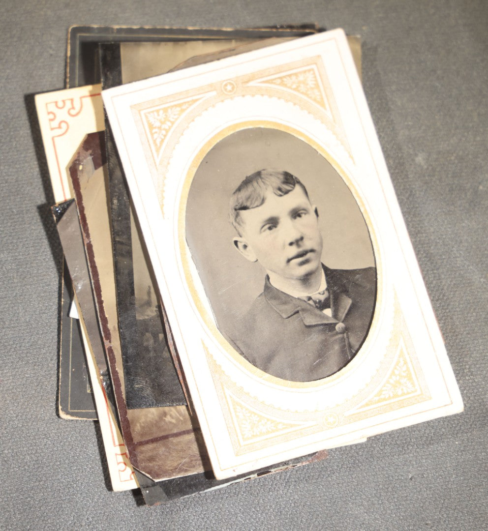 Grouping of 10 Antique Tintype Photographs of Men, Some in Paper Frames and Mats, Including Various Portrait Poses