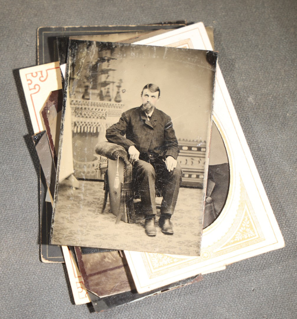 Grouping of 10 Antique Tintype Photographs of Men, Some in Paper Frames and Mats, Including Various Portrait Poses