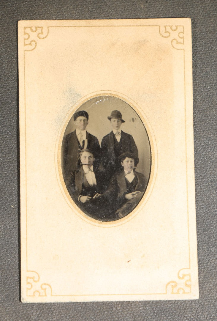 Grouping of Four Antique Tintype Photographs of Couples and Groups including Young Men Smoking Cigars