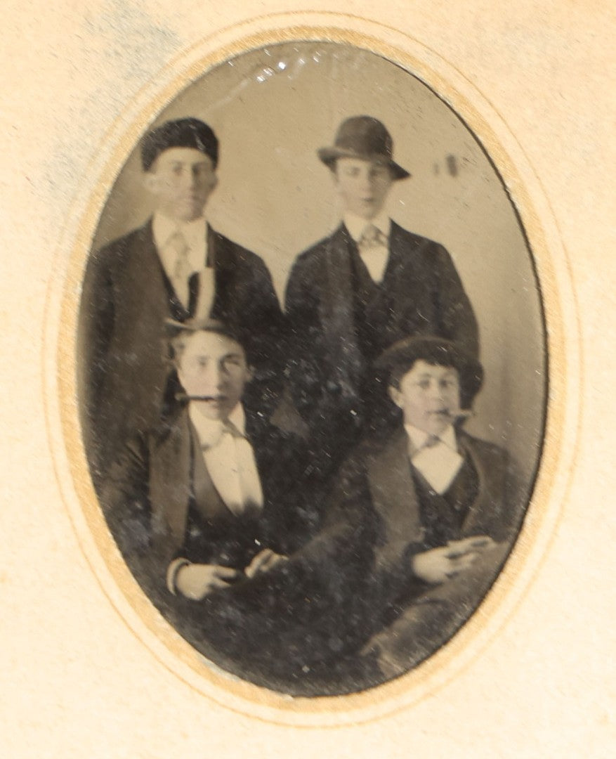 Grouping of Four Antique Tintype Photographs of Couples and Groups including Young Men Smoking Cigars