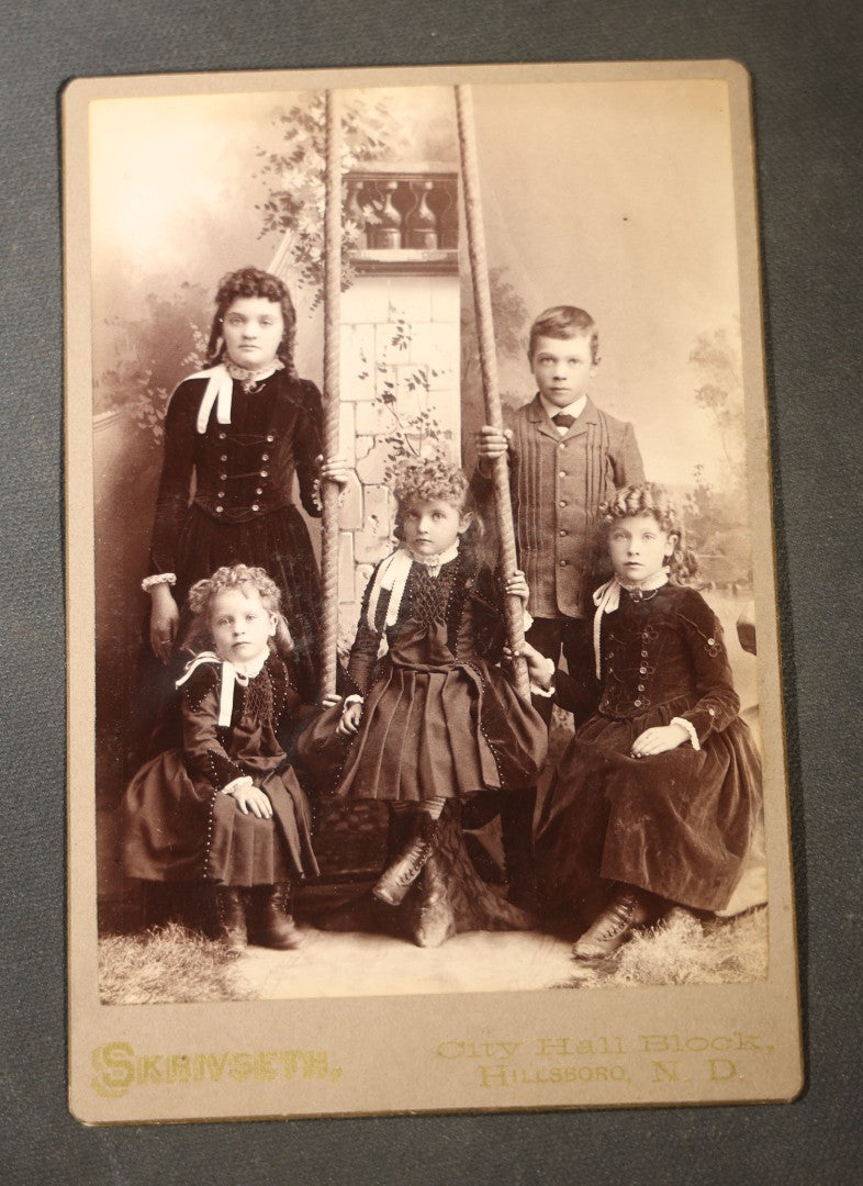 Grouping of Seven Antique Cabinet Card Photographs of Children Including Two Boys in Sailor Suits, with examples by J. L. Skrivseth, Hillsboro, North Dakota