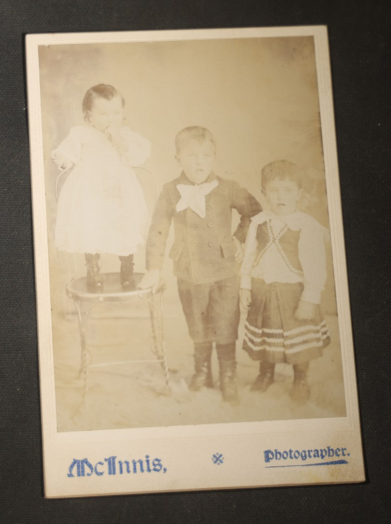 Grouping of Seven Antique Cabinet Card Photographs of Children Including Two Boys in Sailor Suits, with examples by J. L. Skrivseth, Hillsboro, North Dakota