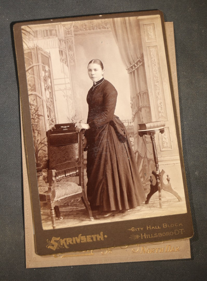 Grouping of Eight Antique Cabinet Card Photographs of Victorian Women Including examples by H.C. Reed, Forest City Iowa, Skrivseth, Hillsboro, North Dakota