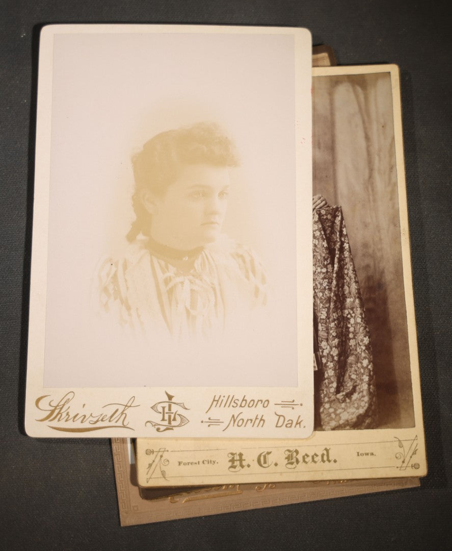 Grouping of Eight Antique Cabinet Card Photographs of Victorian Women Including examples by H.C. Reed, Forest City Iowa, Skrivseth, Hillsboro, North Dakota
