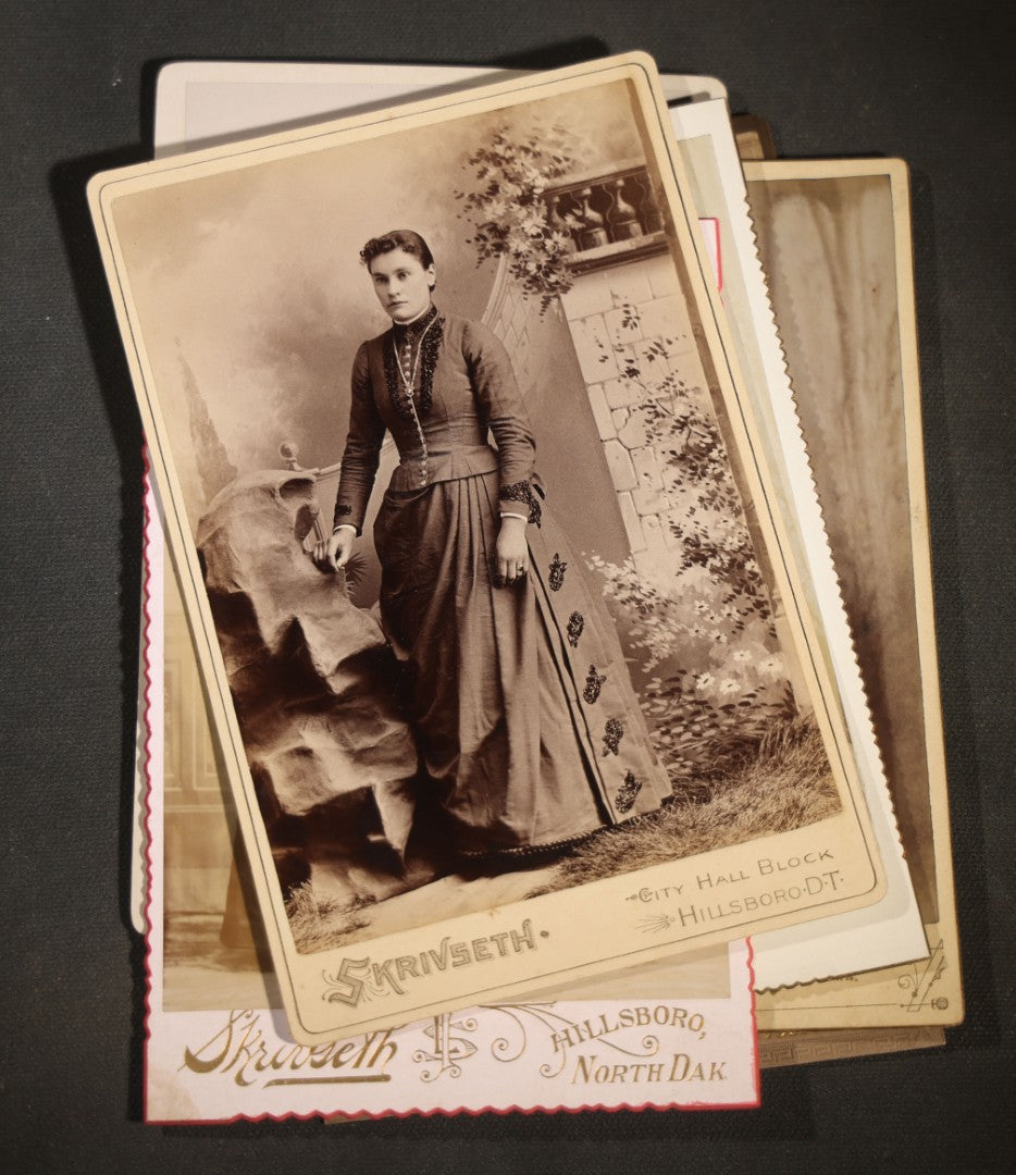 Grouping of Eight Antique Cabinet Card Photographs of Victorian Women Including examples by H.C. Reed, Forest City Iowa, Skrivseth, Hillsboro, North Dakota