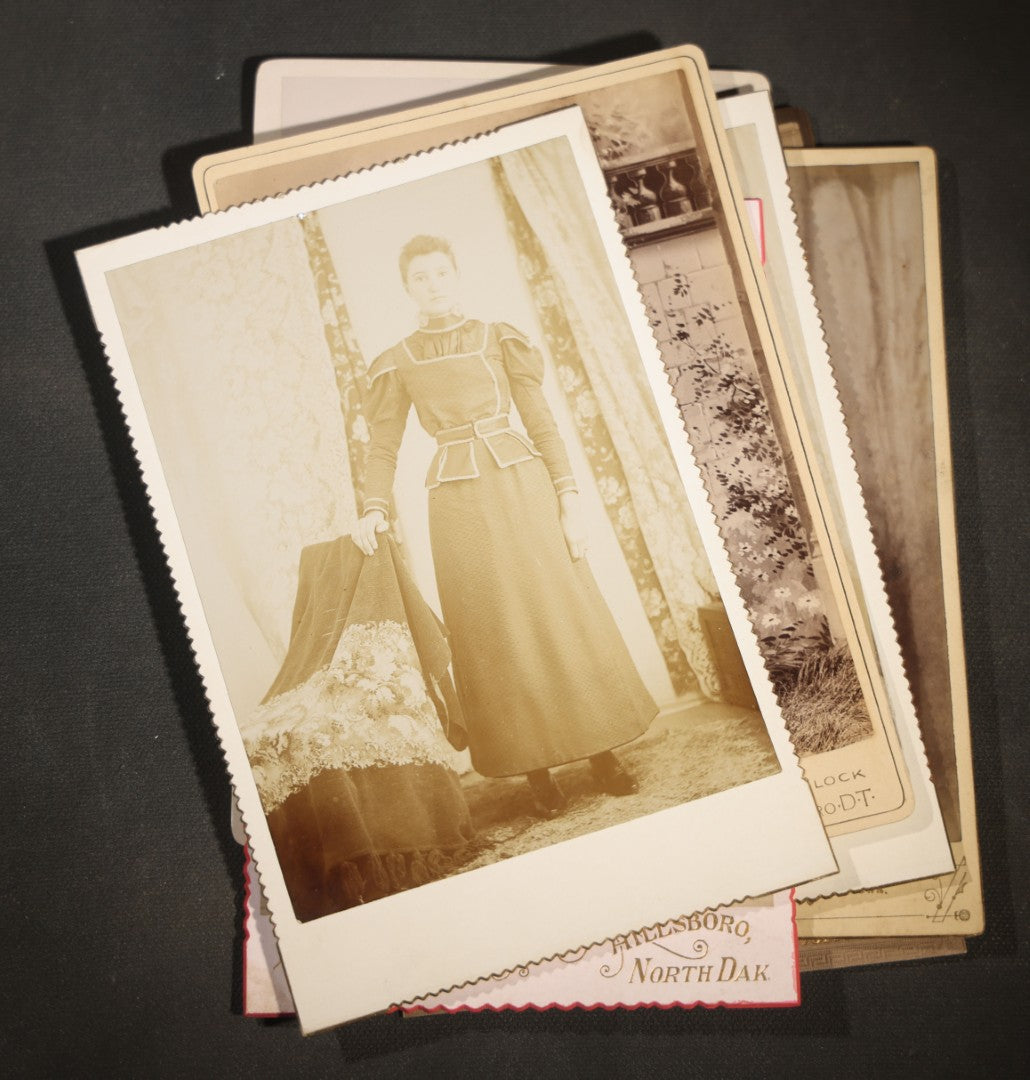Grouping of Eight Antique Cabinet Card Photographs of Victorian Women Including examples by H.C. Reed, Forest City Iowa, Skrivseth, Hillsboro, North Dakota