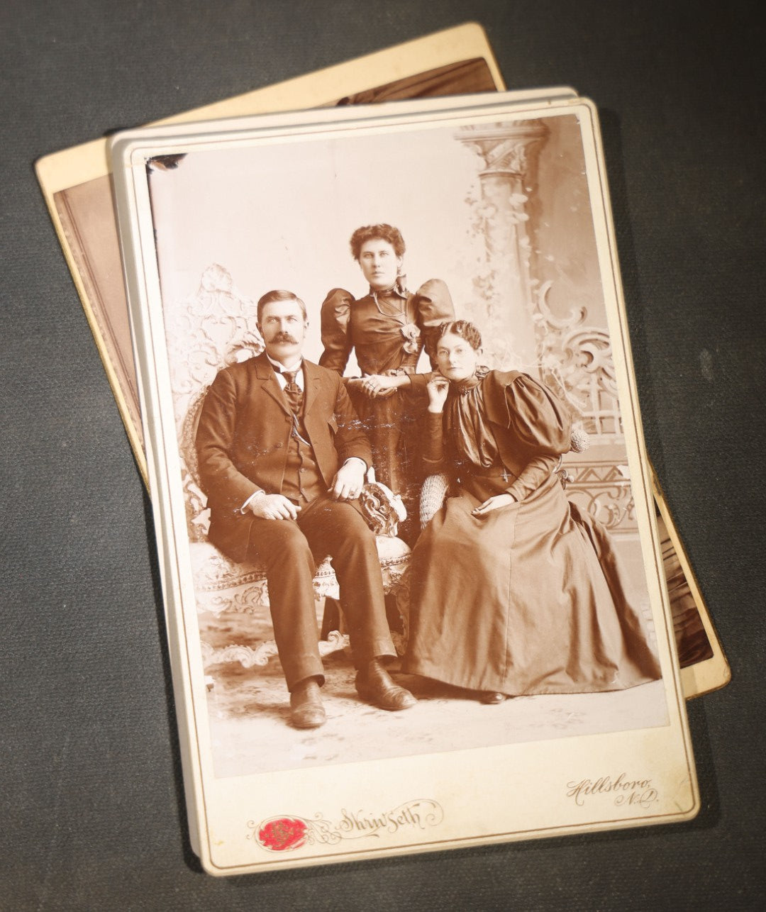 Grouping of Eight Antique Cabinet Card Photographs of Victorian Couples and Family Groups Including by Skrivseth, Hillsboro, North Dakota