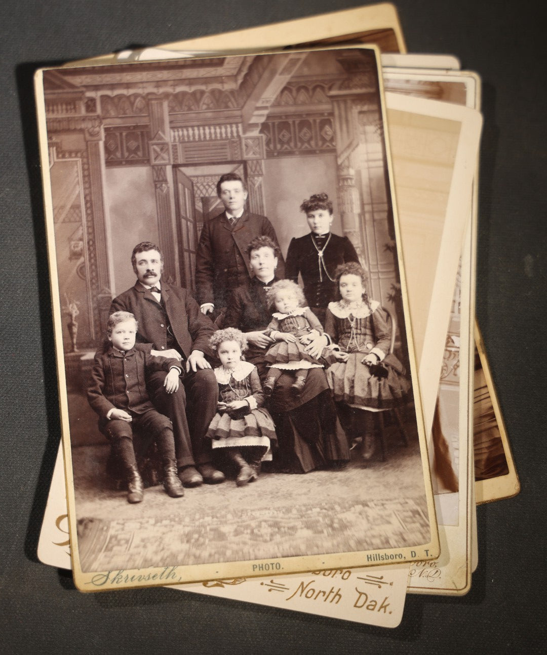 Grouping of Eight Antique Cabinet Card Photographs of Victorian Couples and Family Groups Including by Skrivseth, Hillsboro, North Dakota