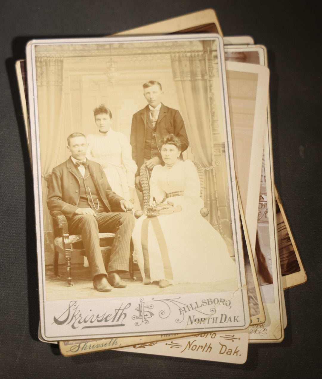 Grouping of Eight Antique Cabinet Card Photographs of Victorian Couples and Family Groups Including by Skrivseth, Hillsboro, North Dakota