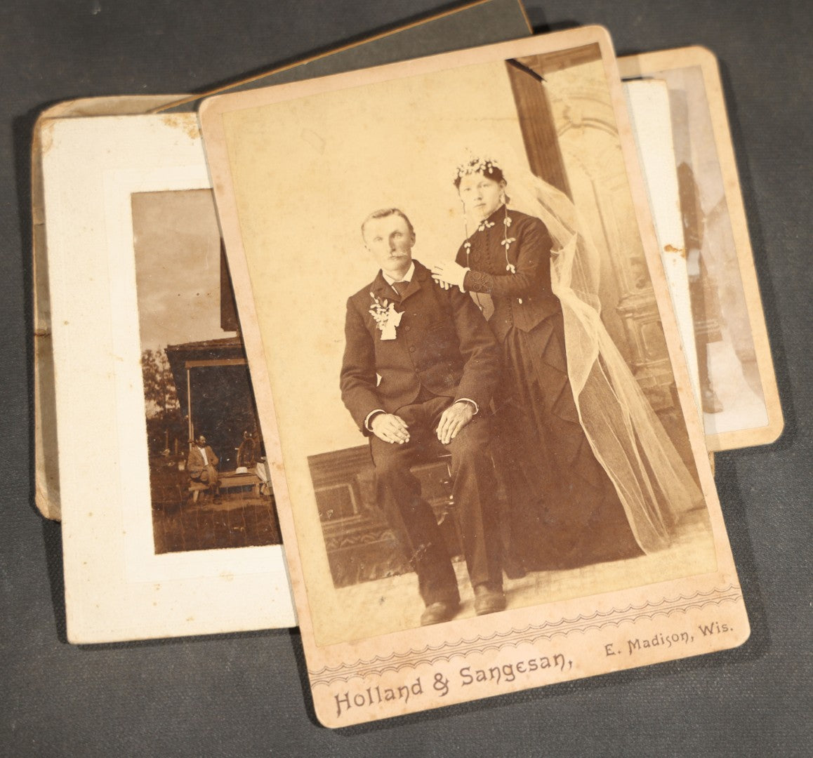 Grouping of 10 Antique and Vintage Photographs including a Boy with Wagon, a Railroad Car, C.D.V.s, cabinet cards, and Family Groups