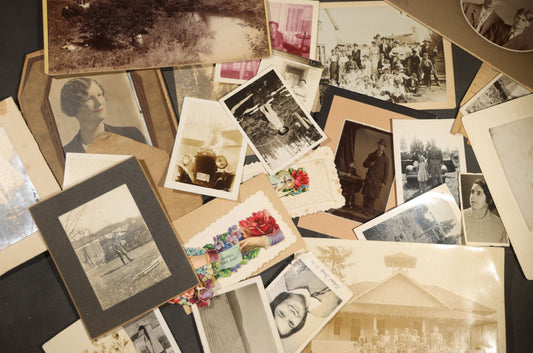 Grouping of 20+ Antique and Vintage Photographs and Ephemera including Board-Mounted Portraits, a Rural River Scenes, Community Gathering, and tintype of man