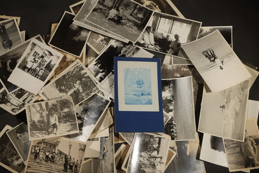 Grouping of 30+ Vintage and antique Snapshots and Real Photo Postcards including Military Personnel, Family Groups, Children, Buildings, Street Scenes, and One Cyanotype