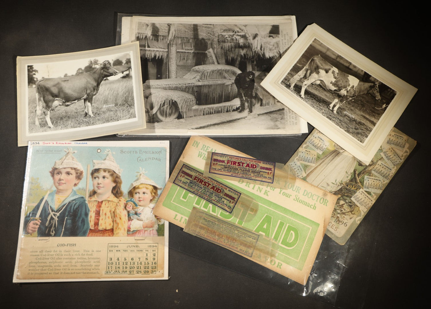Grouping of Ten Antique and Vintage Paper Ephemera, including Scotts Emulsion Calendar 1898, Strohmeyer Inc. Animal Photographs, Kansas City Ice Storm Press Photo, First AidDrink Mix Labels