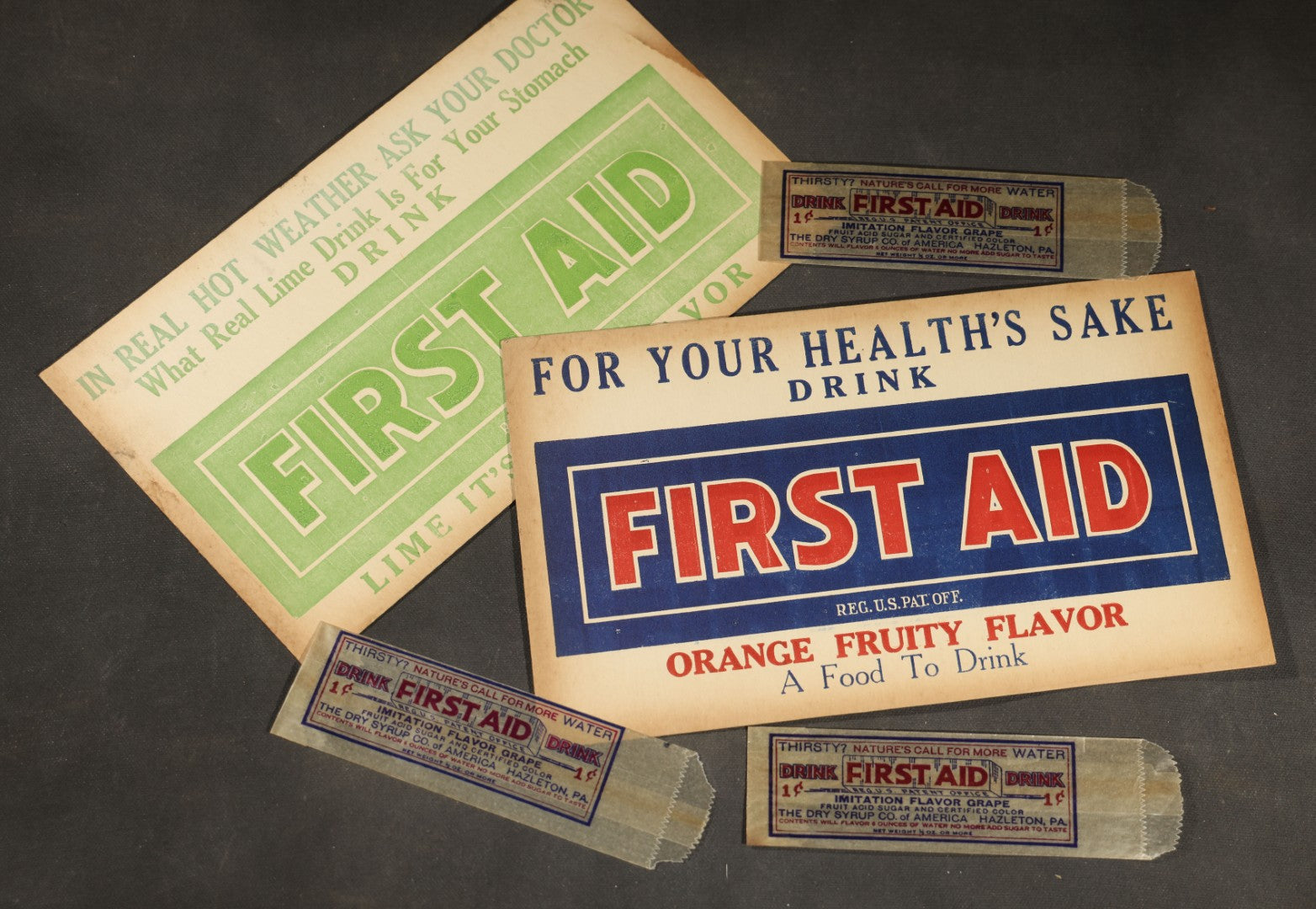 Grouping of Ten Antique and Vintage Paper Ephemera, including Scotts Emulsion Calendar 1898, Strohmeyer Inc. Animal Photographs, Kansas City Ice Storm Press Photo, First AidDrink Mix Labels
