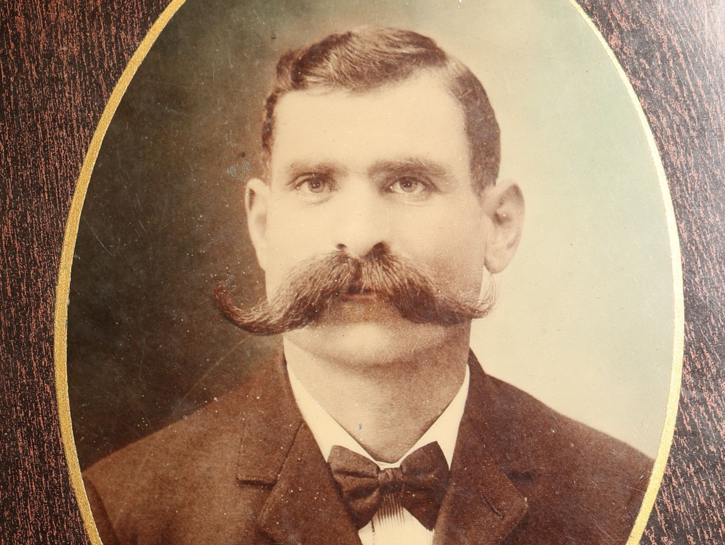 Antique Victorian Celluloid Photo Button with Oval Portrait of Man with Handlebar Mustache in Wood Frame