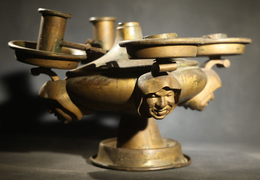 Antique Brass Four-Burner Oil Lamp with Monk Faces Sticking Out Tongues, Missing Two Burners