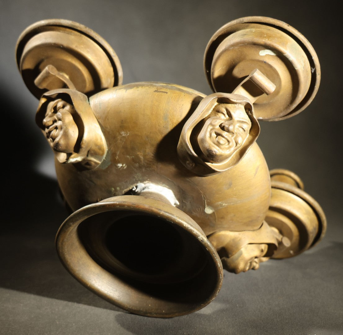 Antique Brass Four-Burner Oil Lamp with Monk Faces Sticking Out Tongues, Missing Two Burners