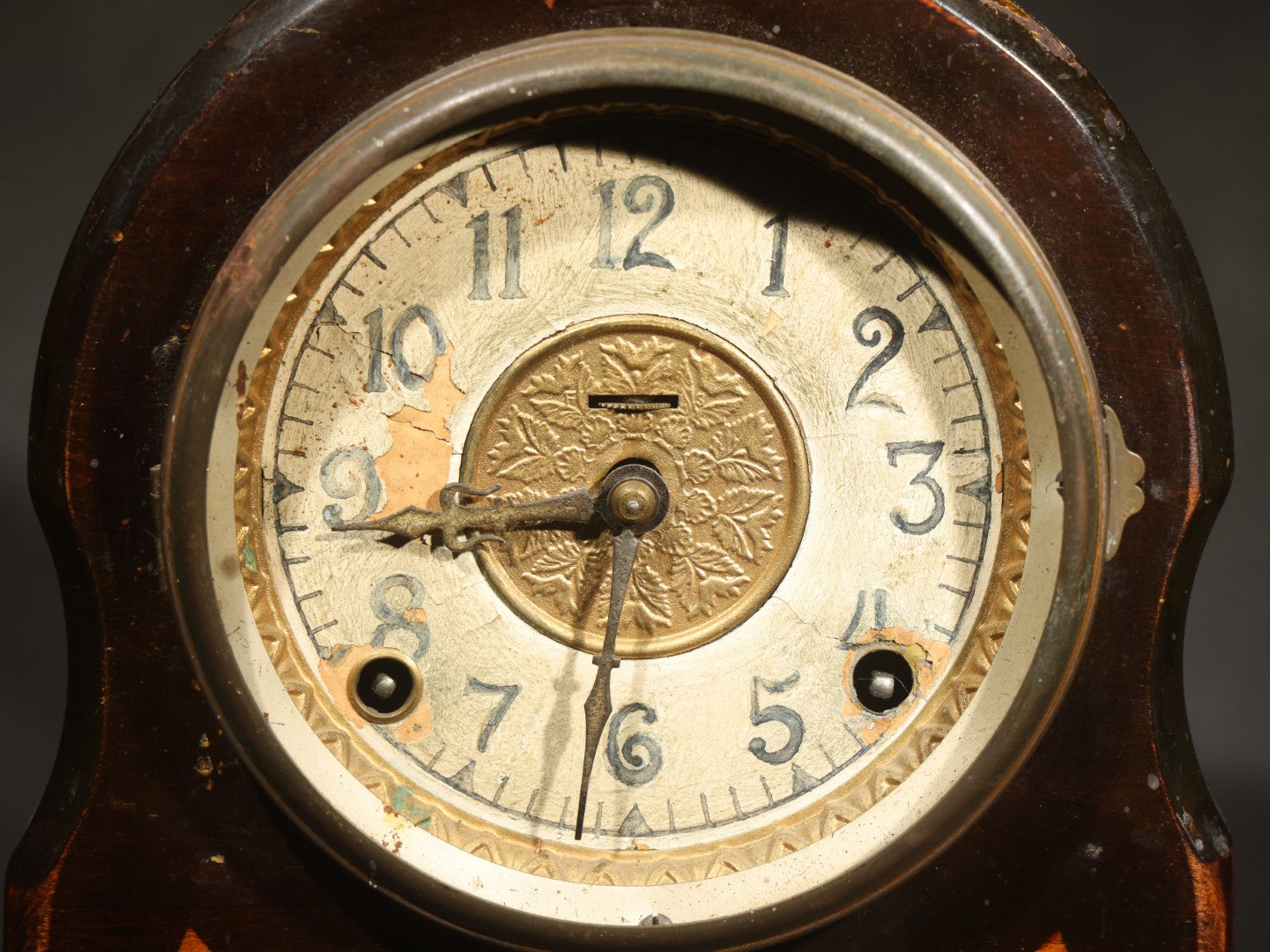 Antique Wooden Mantle Clock with Arched Top, White Dial with Brass Center Medallion, and Geometric Inlay