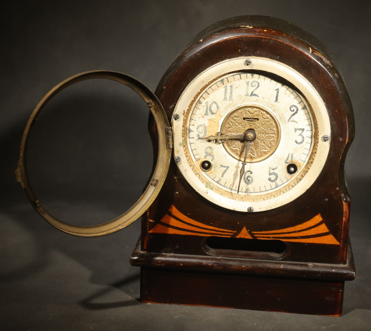 Antique Wooden Mantle Clock with Arched Top, White Dial with Brass Center Medallion, and Geometric Inlay