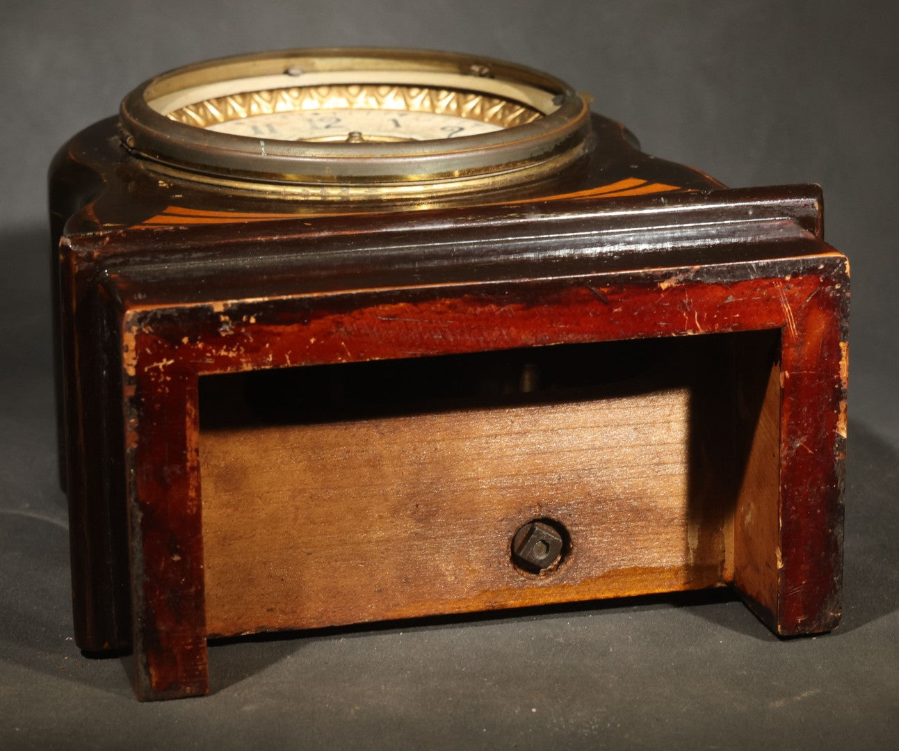 Antique Wooden Mantle Clock with Arched Top, White Dial with Brass Center Medallion, and Geometric Inlay