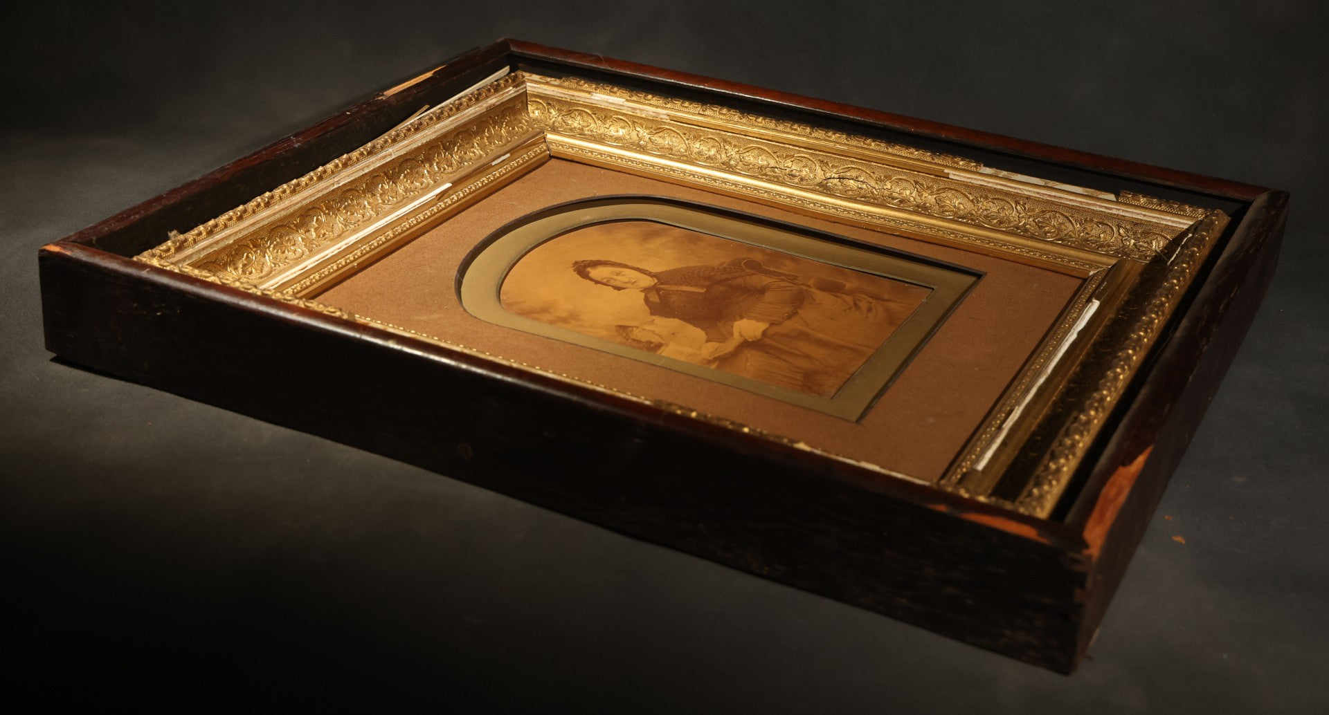 Antique Framed Photograph of a Woman in Dark Victorian Dress Holding a Book, Ornate Gilt and Wood Frame, Note Poor Condition, No Glass, Damage and Losses Throughout