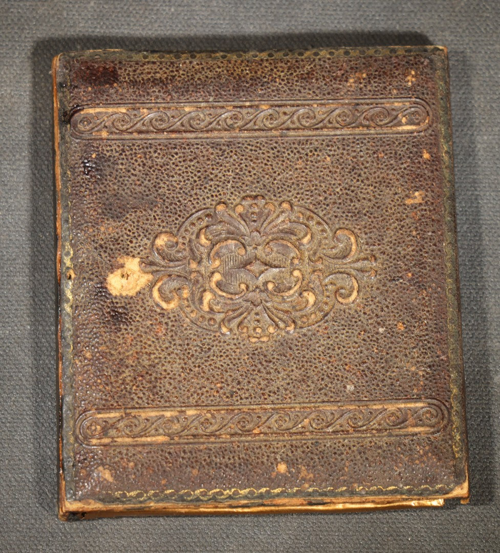 Antique 1/6th Plate Tintype Photograph of a Man in Military Uniform with Brass Buttons in Partial Half Leatherette Union Case with Partial Inscription on Verso