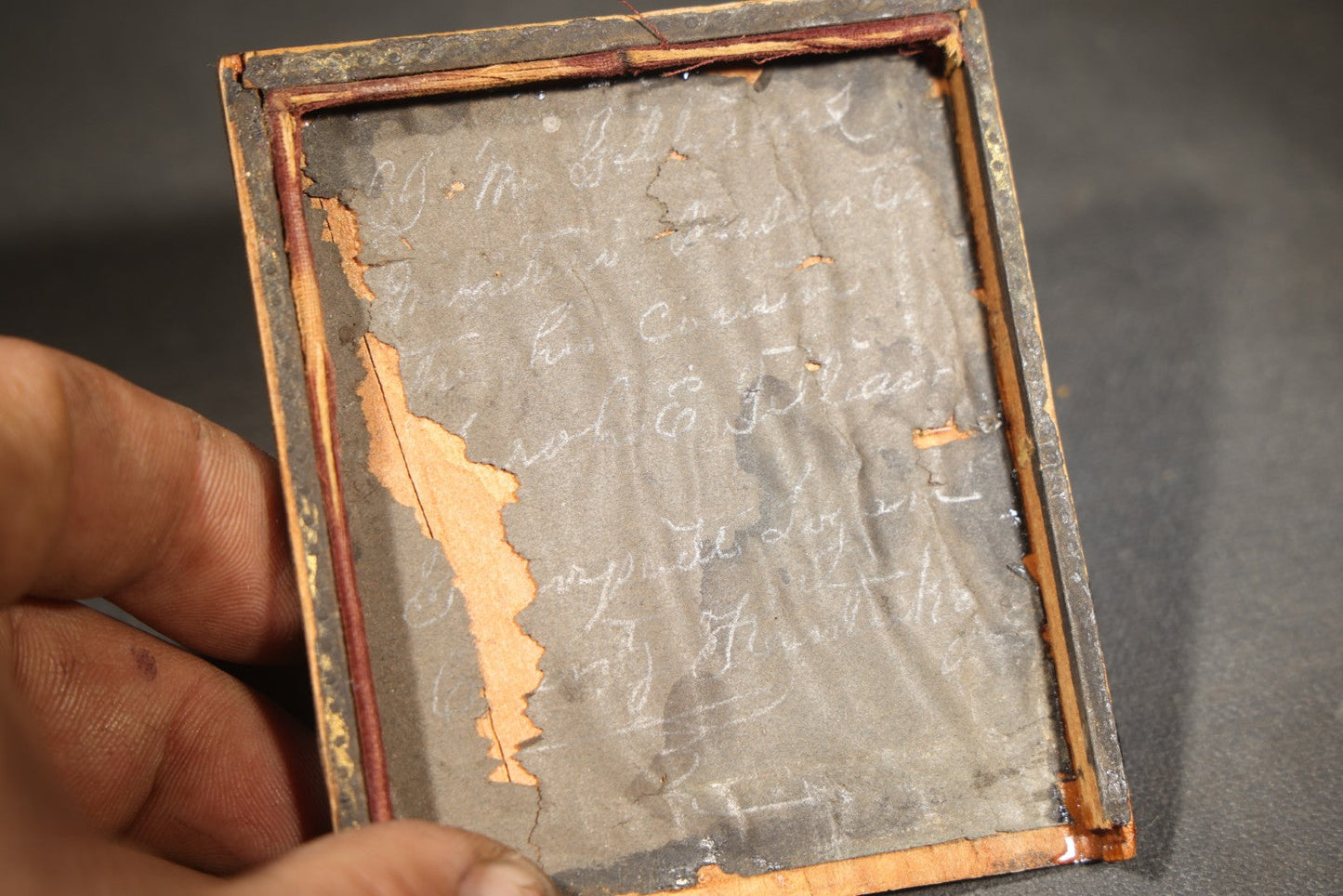 Antique 1/6th Plate Tintype Photograph of a Man in Military Uniform with Brass Buttons in Partial Half Leatherette Union Case with Partial Inscription on Verso