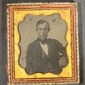 Lot 020 - Antique 1/6th Plate Tintype Photograph of a Young Man in Formal Attire in Half Leatherette Case, Photographed by T. Dale