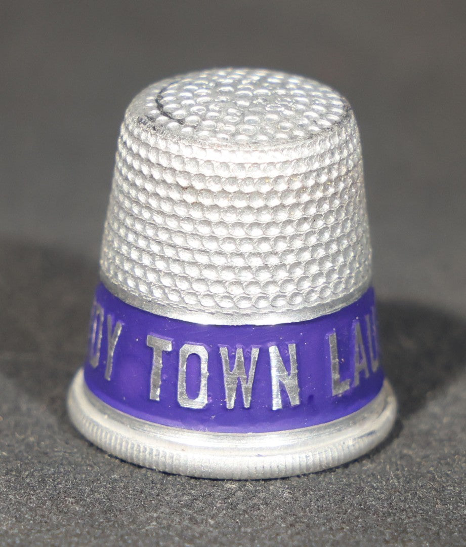 Grouping of 23 Vintage Advertising Thimbles for Toy Town Laundry, Winchendon, Massachusetts, Tel. 325