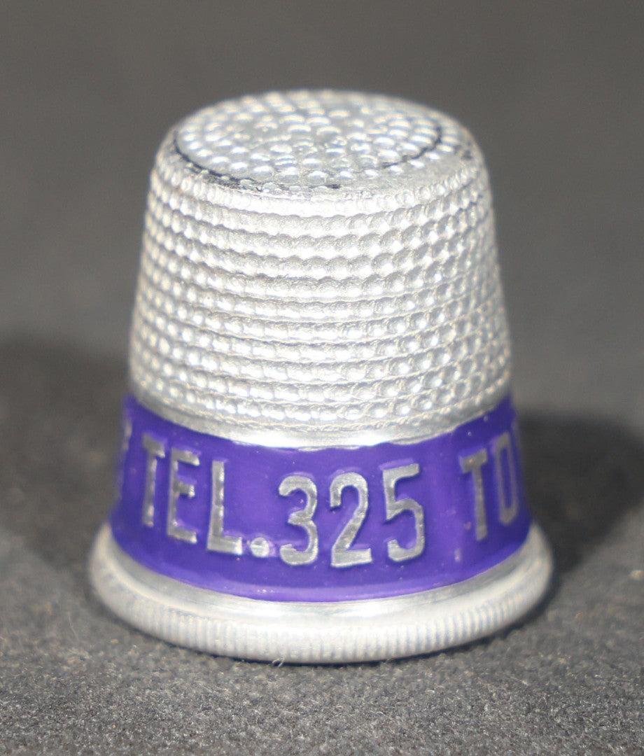 Grouping of 23 Vintage Advertising Thimbles for Toy Town Laundry, Winchendon, Massachusetts, Tel. 325
