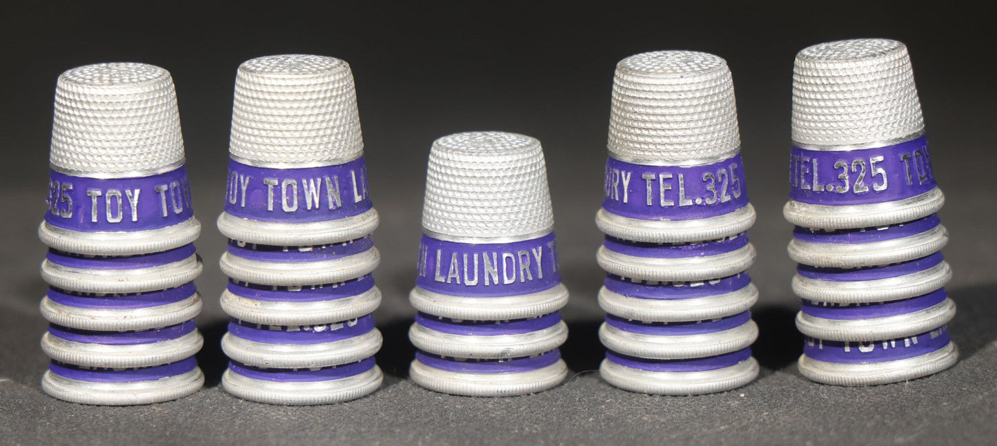 Grouping of 23 Vintage Advertising Thimbles for Toy Town Laundry, Winchendon, Massachusetts, Tel. 325