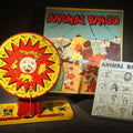 Lot 031 - Vintage Animal Bingo Game with Lithographed Tin Spinner, Bingo Cards, and Markers, Manufactured by Baldwin Manufacturing Co. Inc., Brooklyn, New York