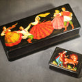 Lot 048 - Pair of Vintage Russian Black Lacquer Boxes with Hand-Painted Folk Dancing and Equestrian Scenes, Gold Borders, Larger Box Marked Made in U.S.S.R.
