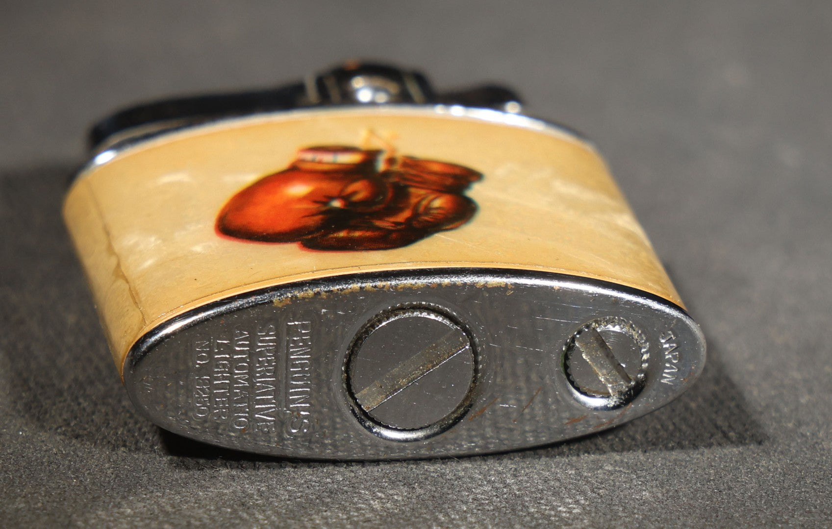Vintage Penguin Pocket Lighter with Boxing Graphics, Two Boxers on One Side and Boxing Gloves on Reverse