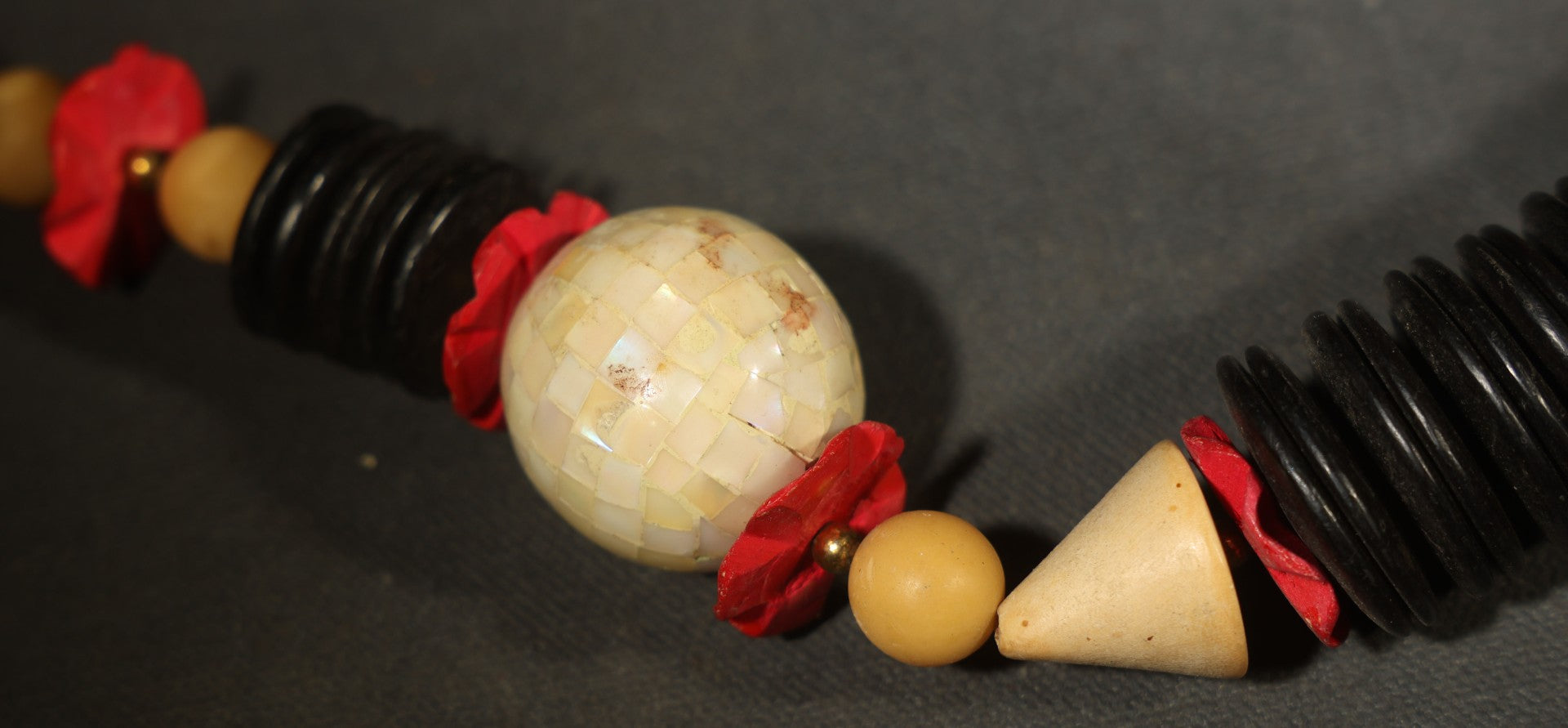 Vintage Mixed Media Beaded Necklace with Black Disc Beads, Red Elements, and Natural-Toned Round Beads