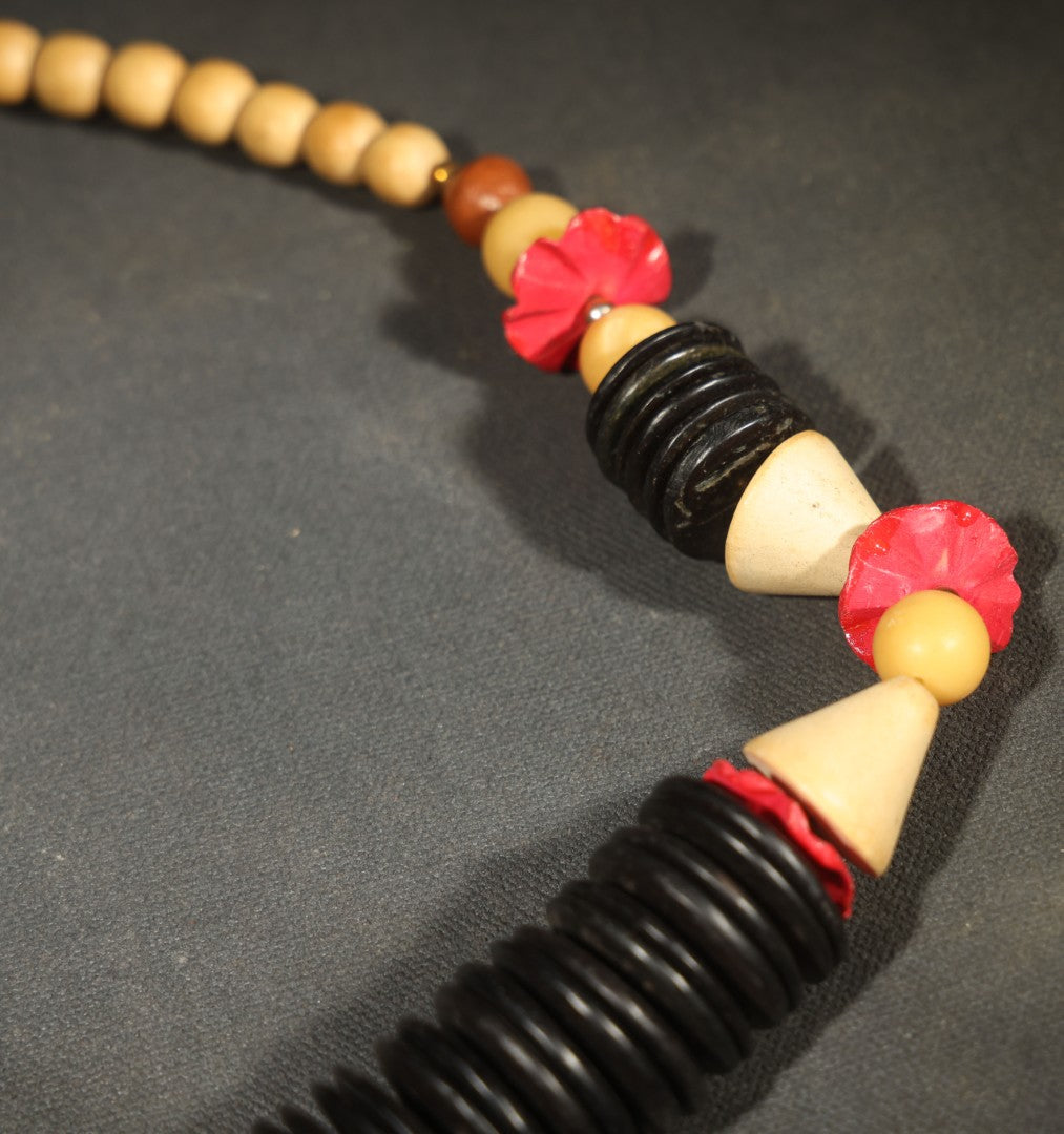 Vintage Mixed Media Beaded Necklace with Black Disc Beads, Red Elements, and Natural-Toned Round Beads