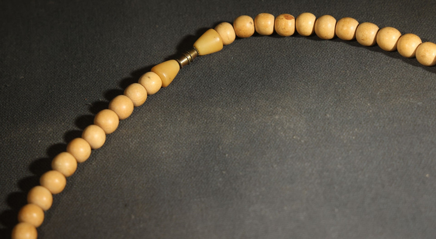 Vintage Mixed Media Beaded Necklace with Black Disc Beads, Red Elements, and Natural-Toned Round Beads