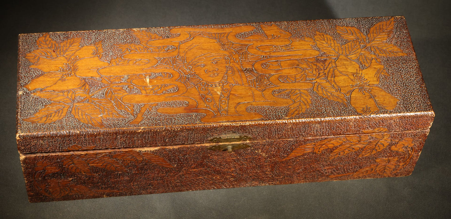 Pair of Antique Pyrography Boxes Including Signed "C.O.D. 1904" Rectangular Example with Dutch Figures and Round "Mount Washington Box" with Rose Design