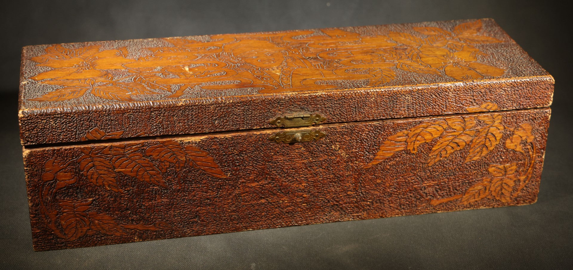 Pair of Antique Pyrography Boxes Including Signed "C.O.D. 1904" Rectangular Example with Dutch Figures and Round "Mount Washington Box" with Rose Design