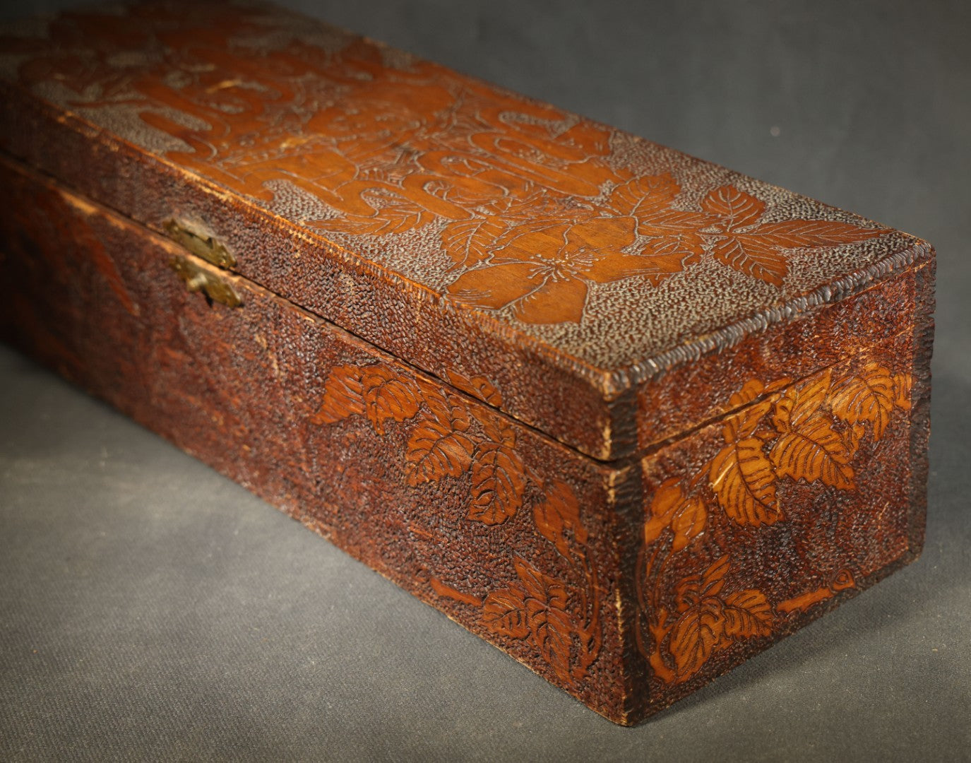Pair of Antique Pyrography Boxes Including Signed "C.O.D. 1904" Rectangular Example with Dutch Figures and Round "Mount Washington Box" with Rose Design
