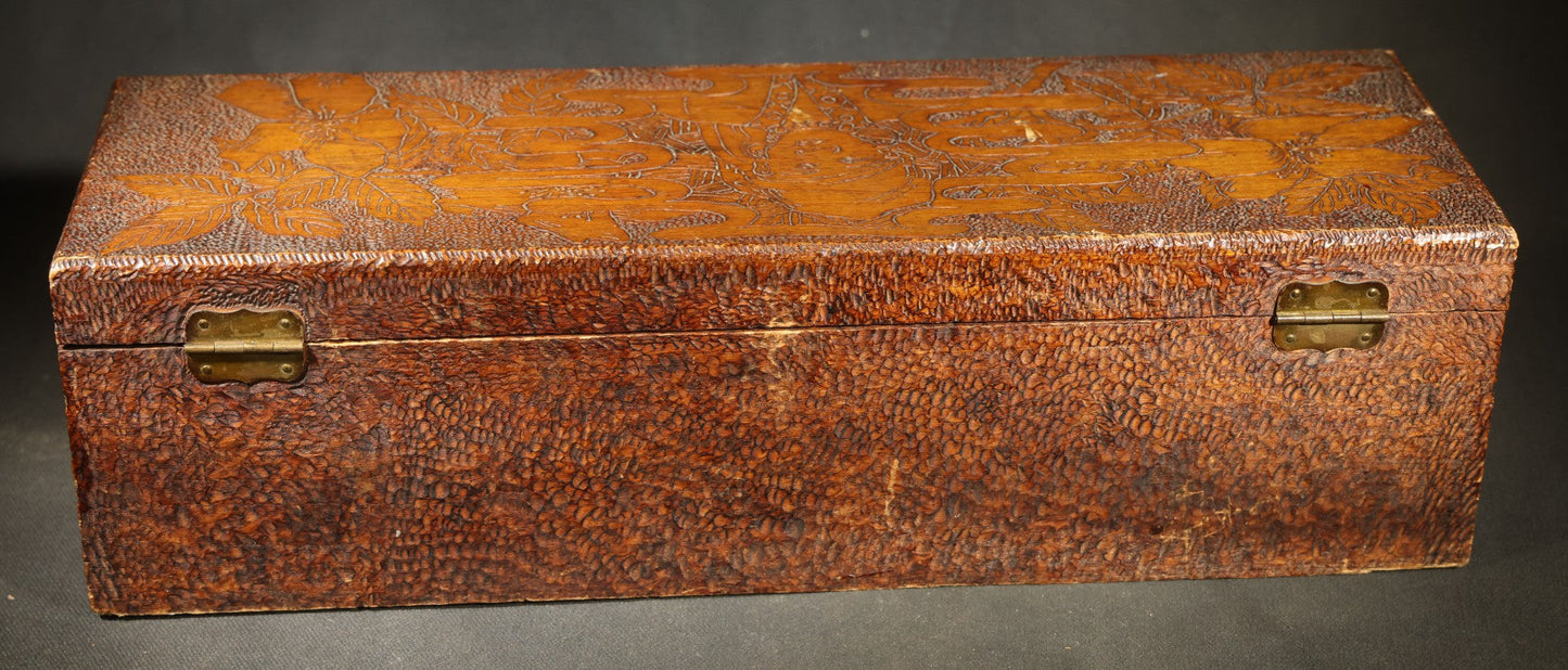 Pair of Antique Pyrography Boxes Including Signed "C.O.D. 1904" Rectangular Example with Dutch Figures and Round "Mount Washington Box" with Rose Design