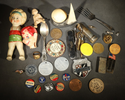 Vintage Junk Drawer Lot Including Bisque Doll, Howdy Doody Head Political Campaign Pins, Advertising Pocket Mirror, Tokens, Keys, and Silverplate Flatware