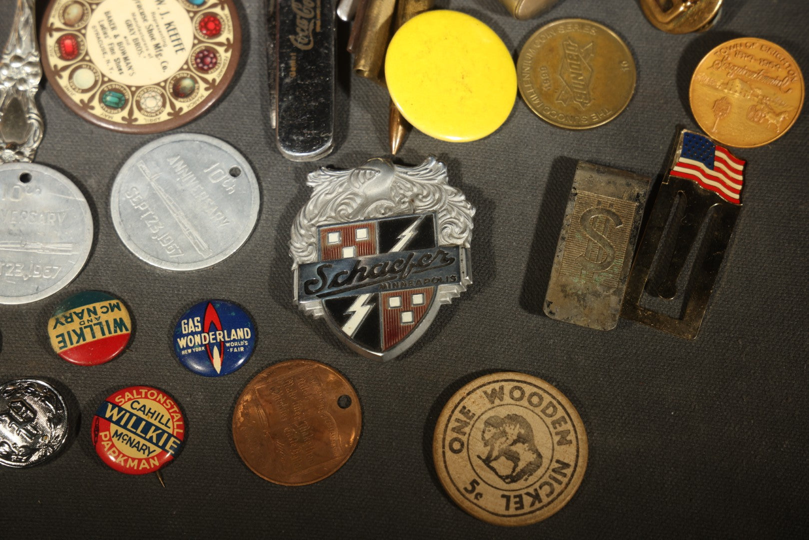 Vintage Junk Drawer Lot Including Bisque Doll, Howdy Doody Head Political Campaign Pins, Advertising Pocket Mirror, Tokens, Keys, and Silverplate Flatware