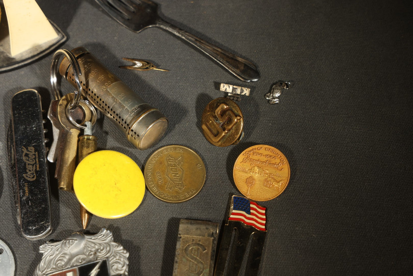 Vintage Junk Drawer Lot Including Bisque Doll, Howdy Doody Head Political Campaign Pins, Advertising Pocket Mirror, Tokens, Keys, and Silverplate Flatware