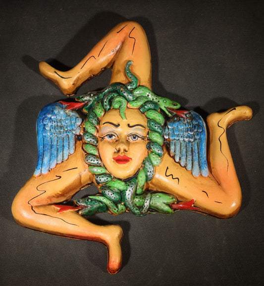 Vintage Cast Metal Sicilian Trinacria with Polychrome Painted Medusa Head, Green Serpent Hair, Blue Wings, and Three Orange Legs in Triskelion Formation
