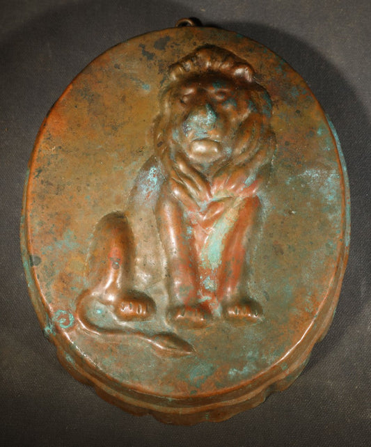 Vintage Copper Toned Lion Mold with Seated Lion Design, Marked Made in Switzerland