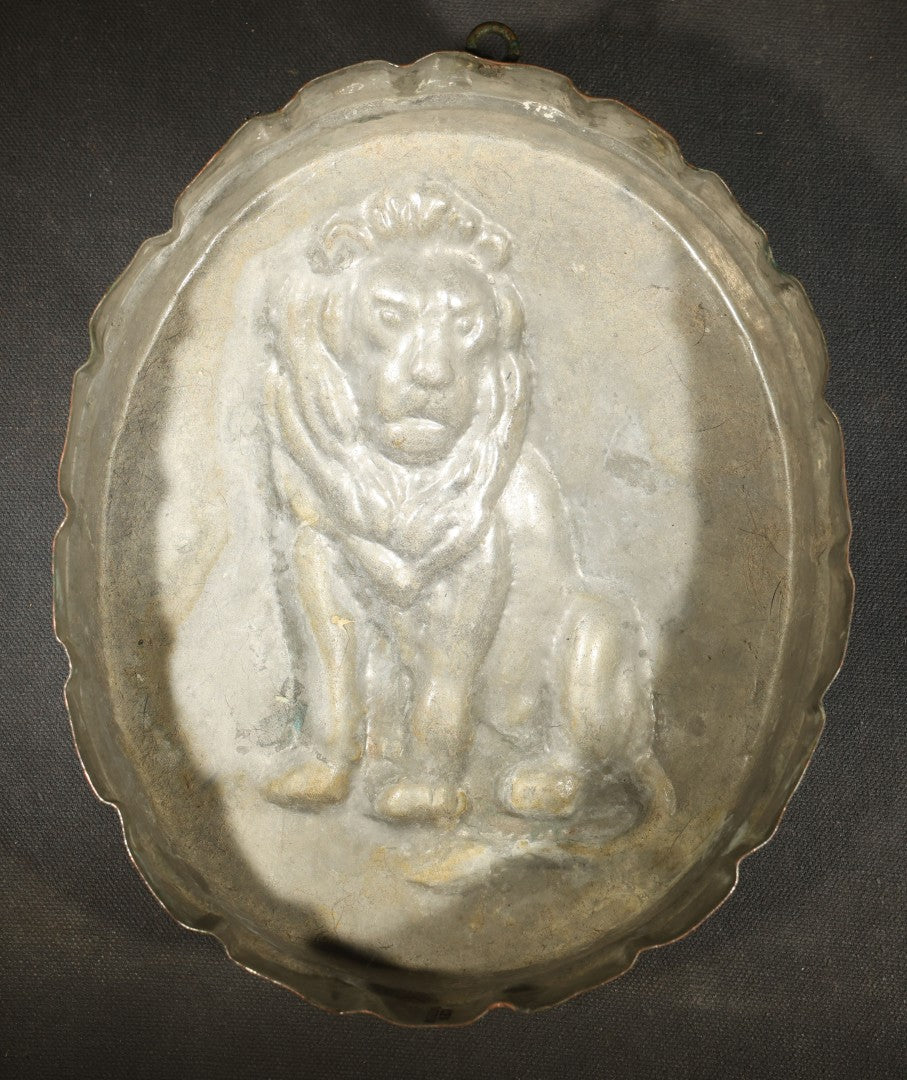Vintage Copper Toned Lion Mold with Seated Lion Design, Marked Made in Switzerland