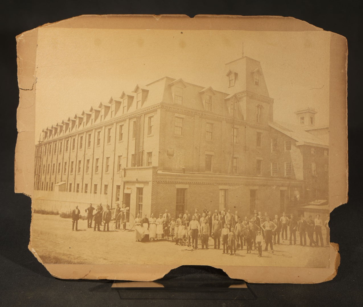 Trio of Vintage Board-Mounted Photographs Including Two-Story House with American Flags, Multi-Story Industrial Building with Gathered Crowd and High Wheel Bicycle, and Small Railroad Depot
