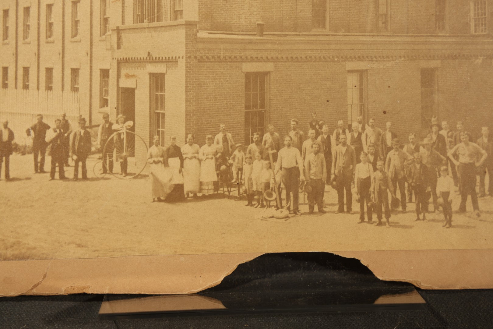 Trio of Vintage Board-Mounted Photographs Including Two-Story House with American Flags, Multi-Story Industrial Building with Gathered Crowd and High Wheel Bicycle, and Small Railroad Depot