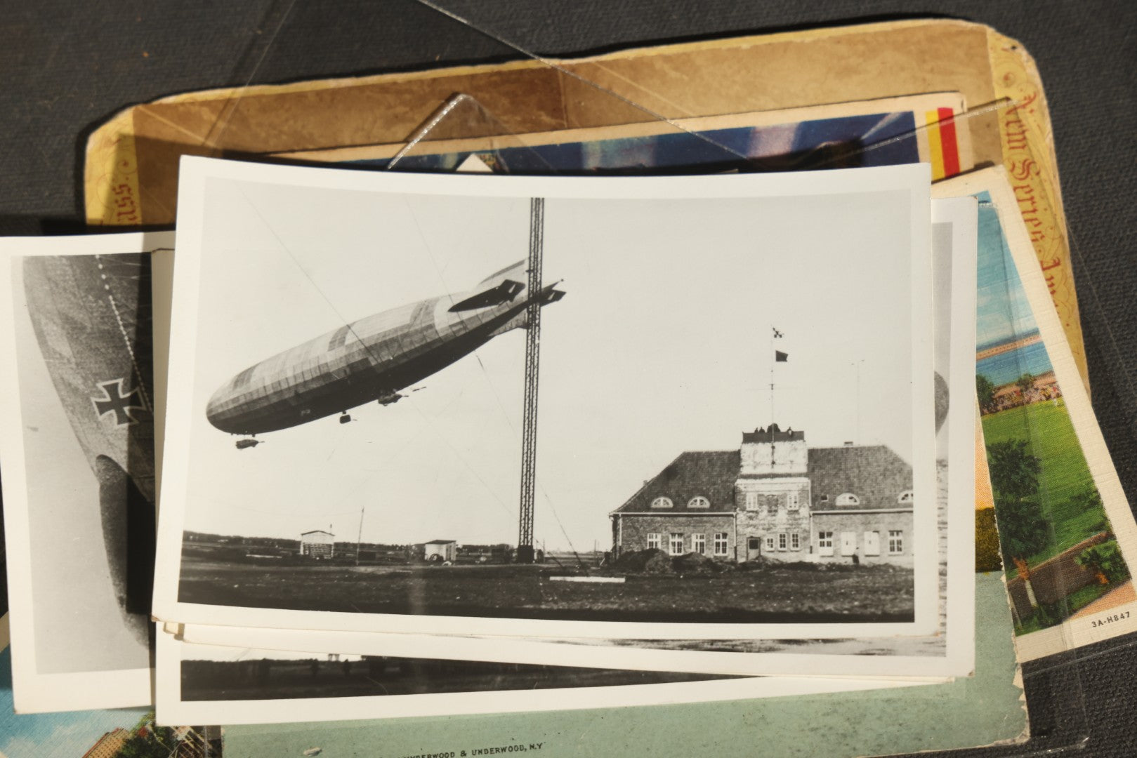 Grouping of 20+ Vintage Zeppelin and Dirigible Ephemera including Real Photo Postcards R.P.P.C., Seaside Heights Souvenir, and Portrait of Ferdinand Von Zeppelin